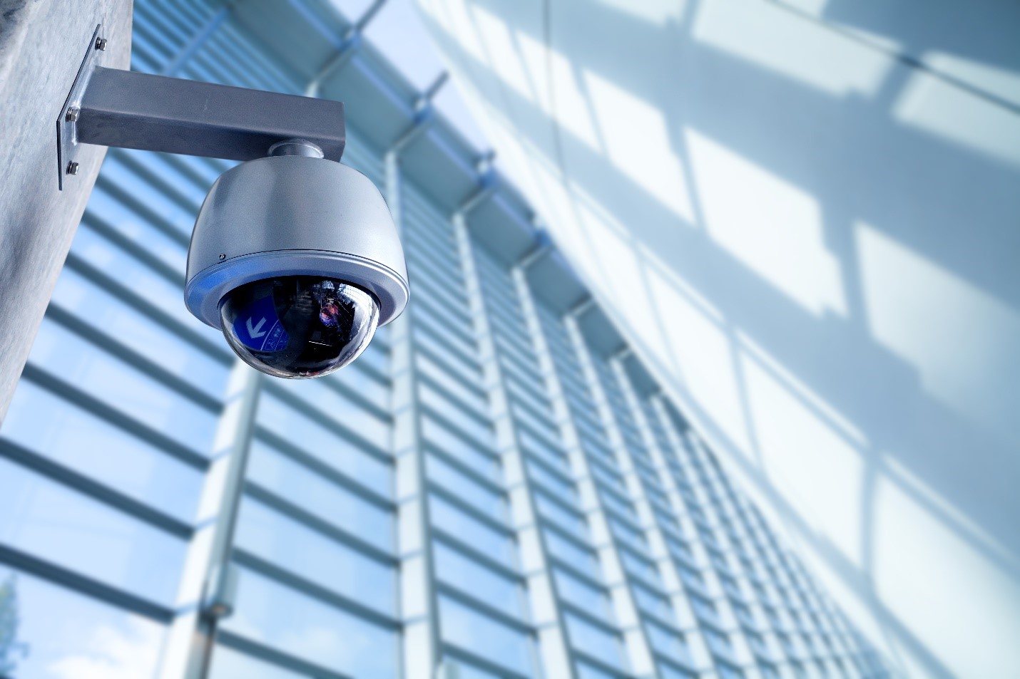 Surveillance camera on the wall in an office building